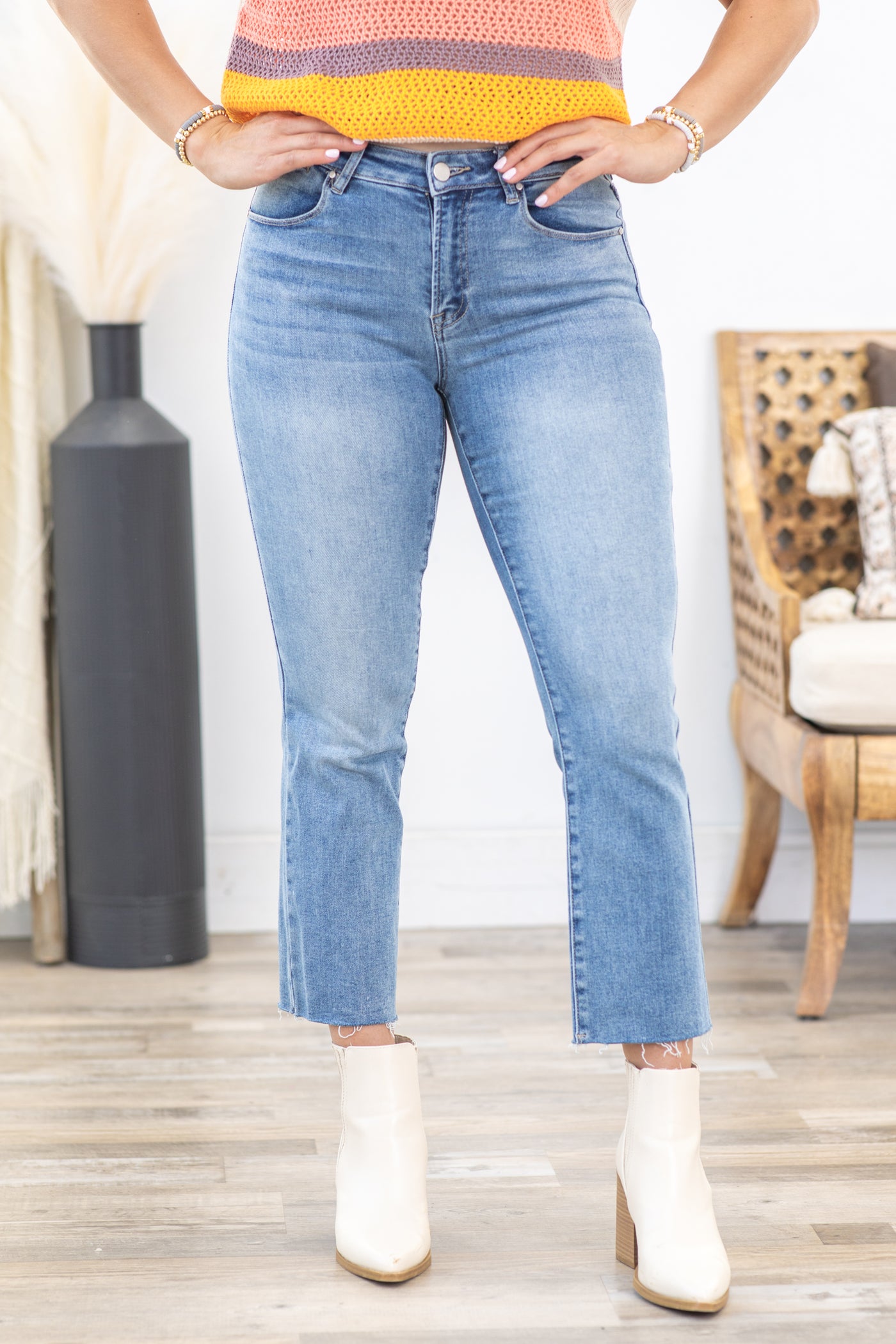 Risen Mid Rise Raw Hem Straight Leg Jeans