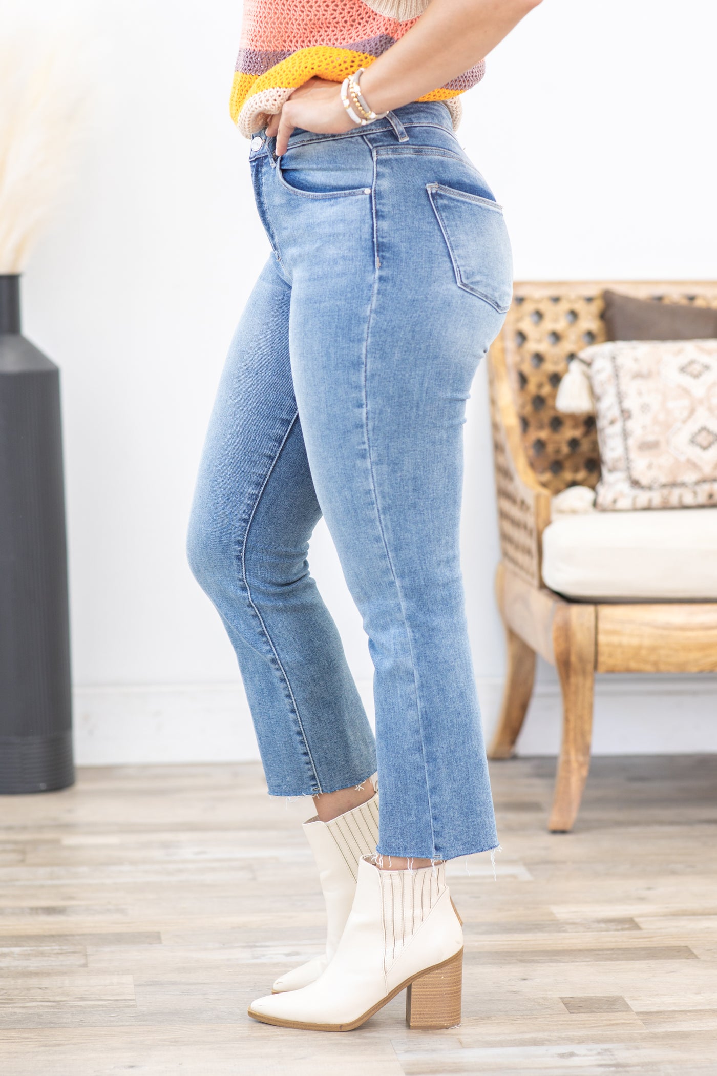 Risen Mid Rise Raw Hem Straight Leg Jeans