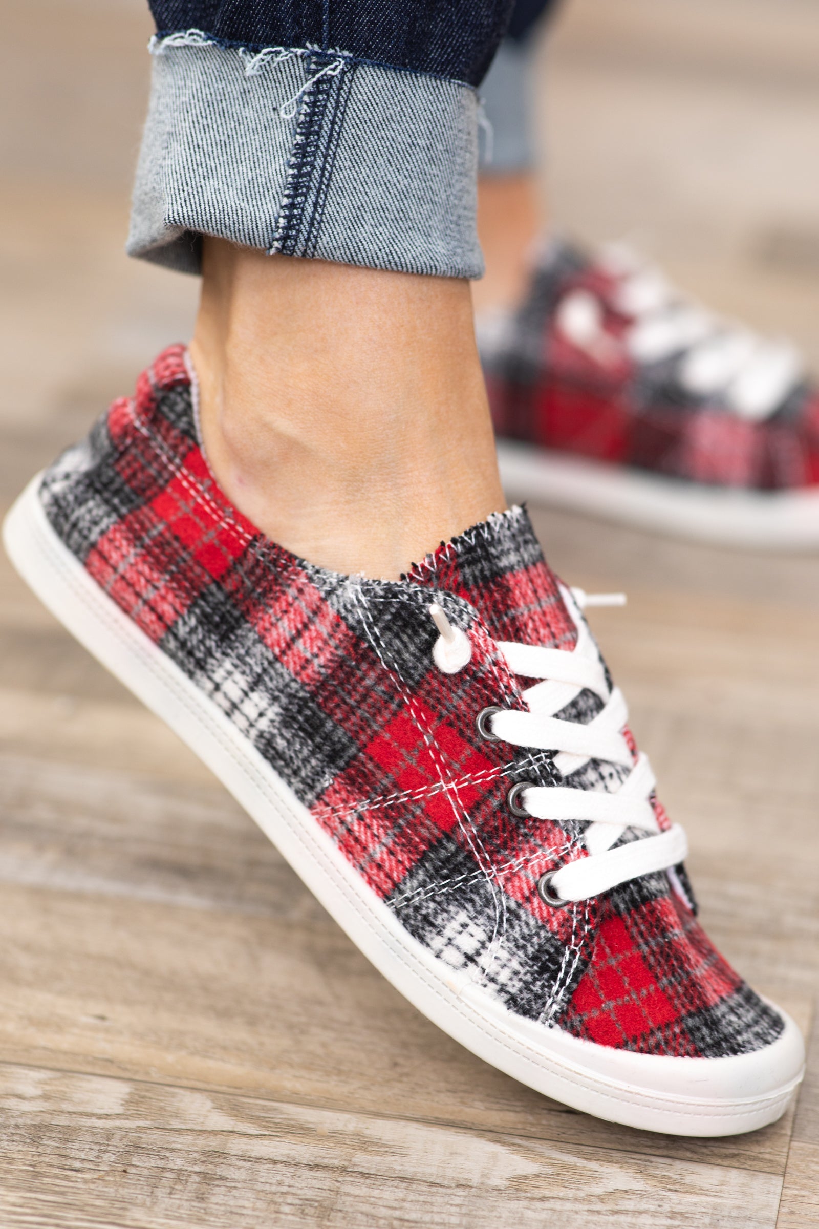 Red and store black plaid sneakers