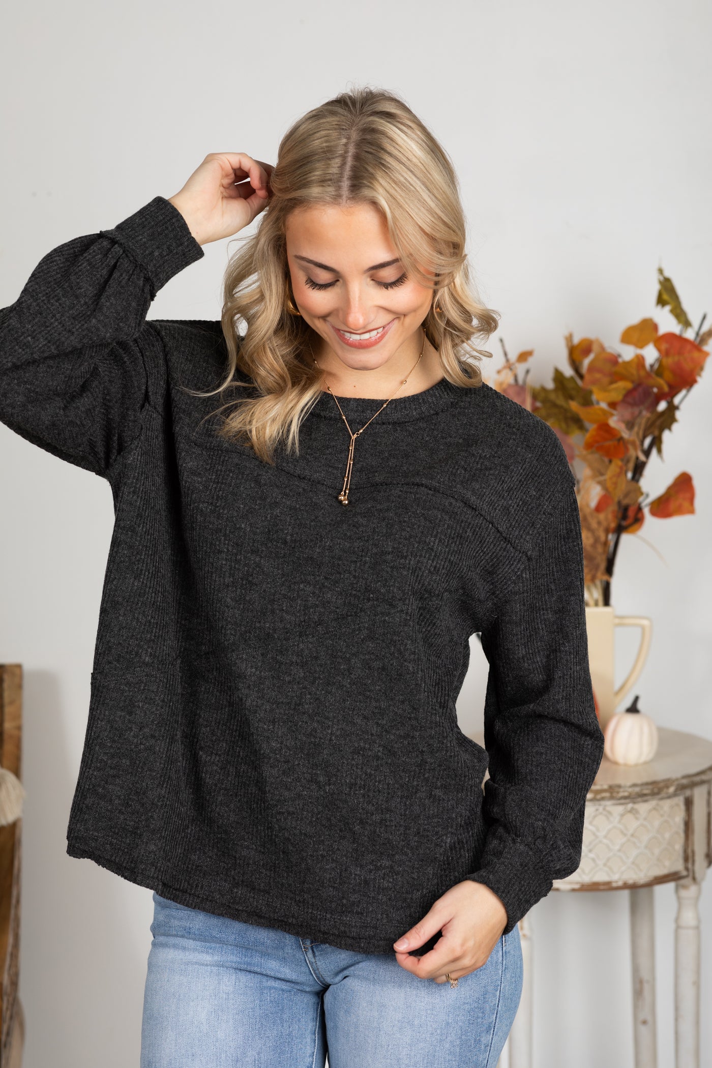 Solid Knit Top With Asymmetrical Exposed Seams