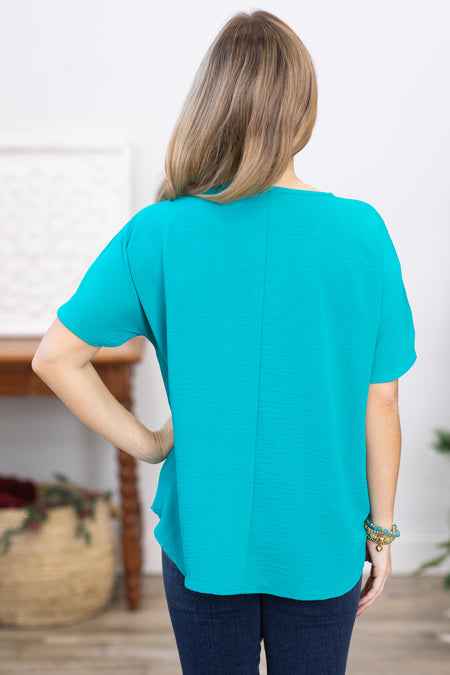 Teal V-Neck Airflow Woven Top