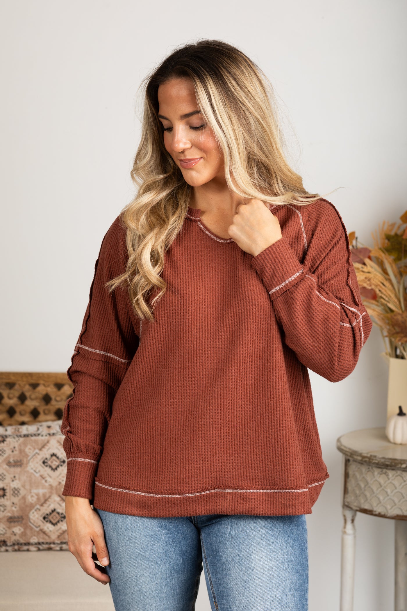 Notched Neck With Exposed Seams Knit Top