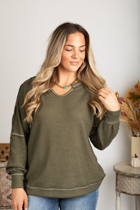 Notched Neck With Exposed Seams Knit Top