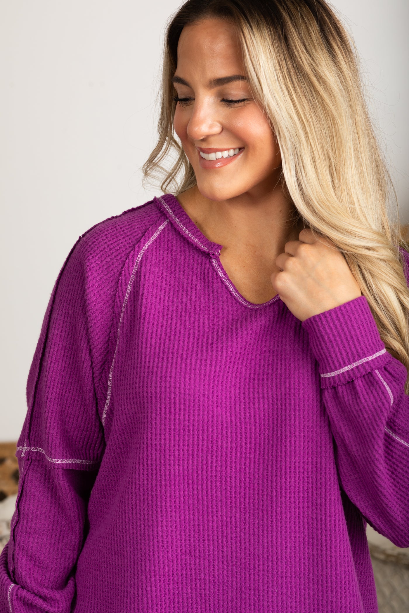 Notched Neck With Exposed Seams Knit Top