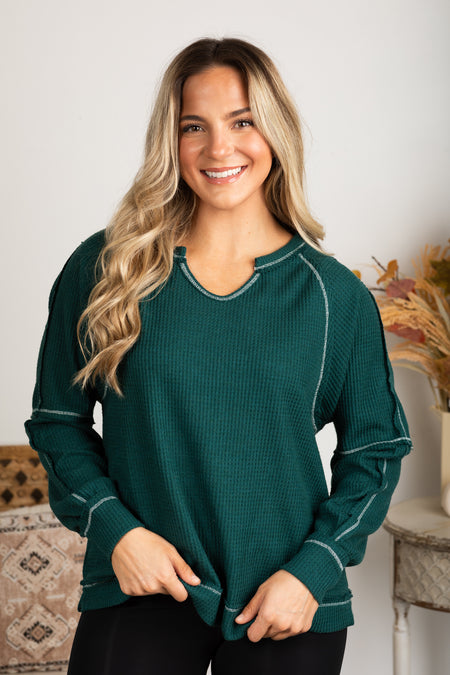 Notched Neck With Exposed Seams Knit Top