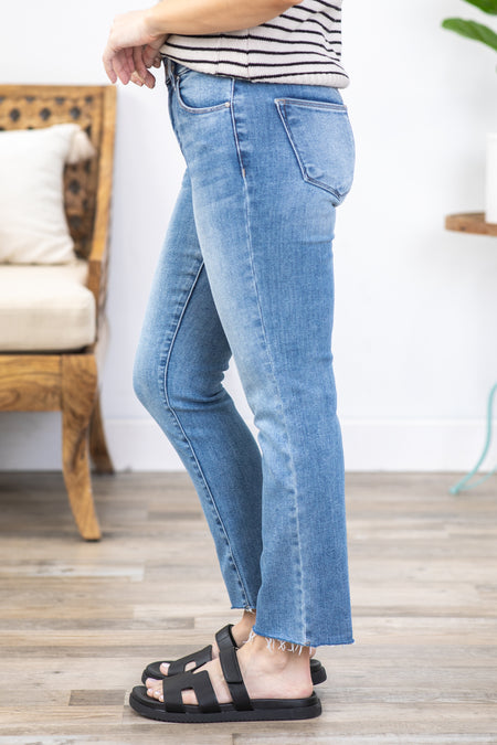 Risen Mid Rise Raw Hem Straight Leg Jeans