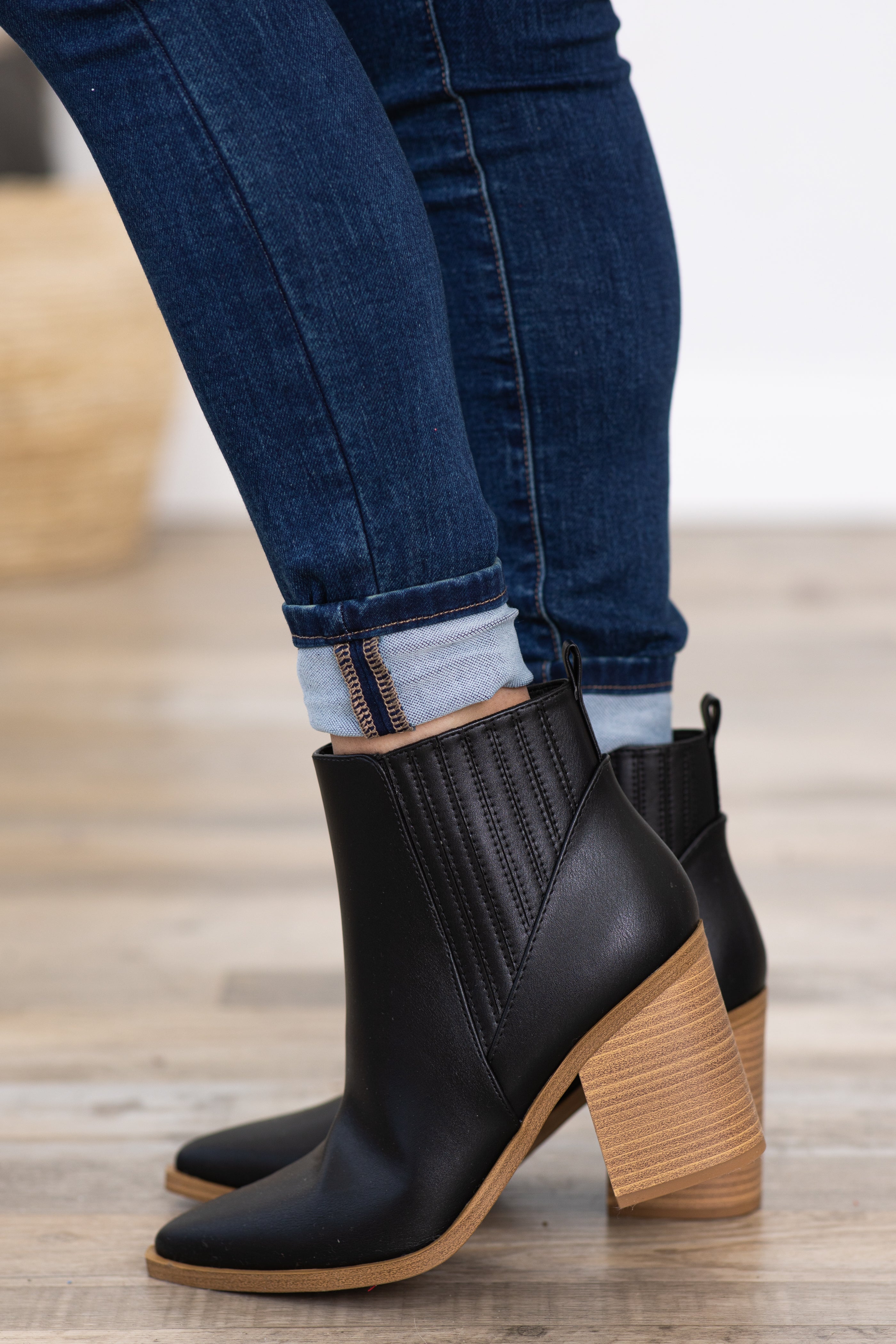 Black and cheap tan booties