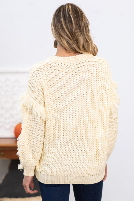 Cream Cable Knit Sweater With Fringe Trim