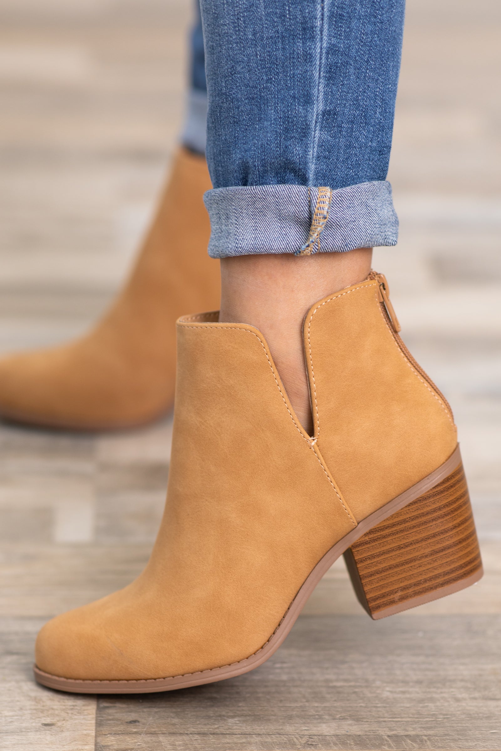 Booties with back outlet zipper