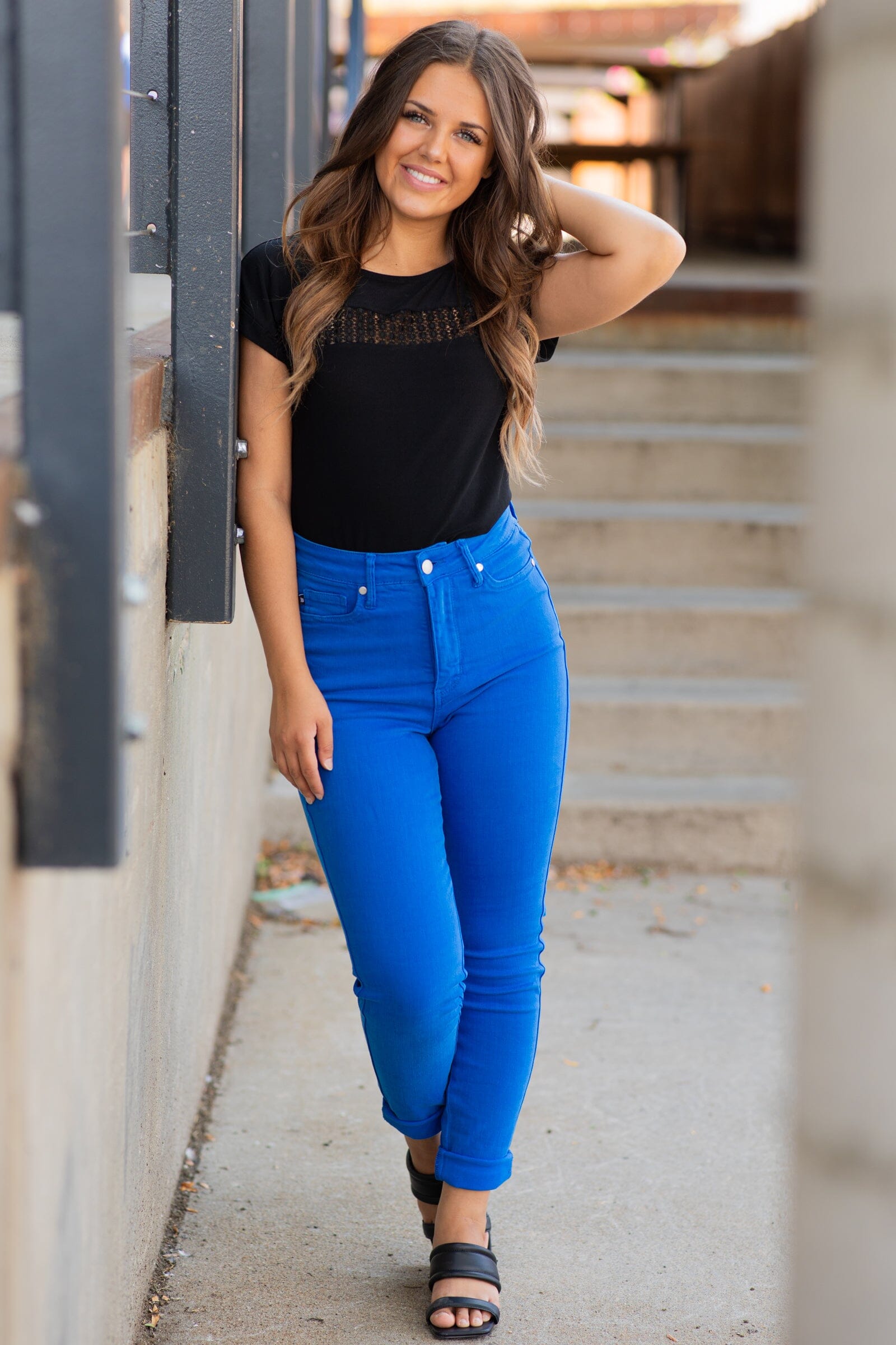 Cobalt blue shirt, jeans and black boots, informal outfit