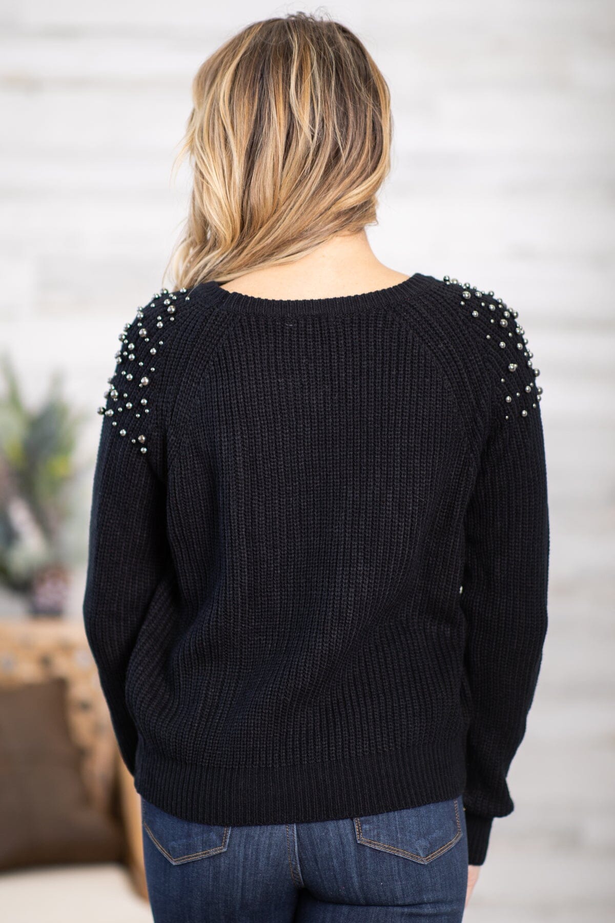 Black 2025 studded sweater