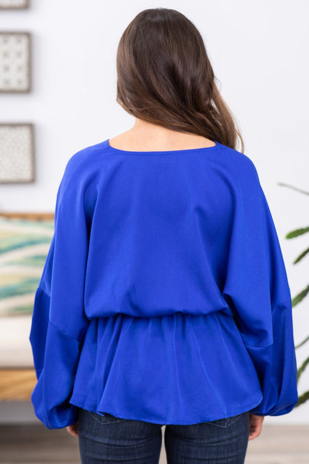 Cobalt V-Neck Peplum Top With Tie Detail - Filly Flair